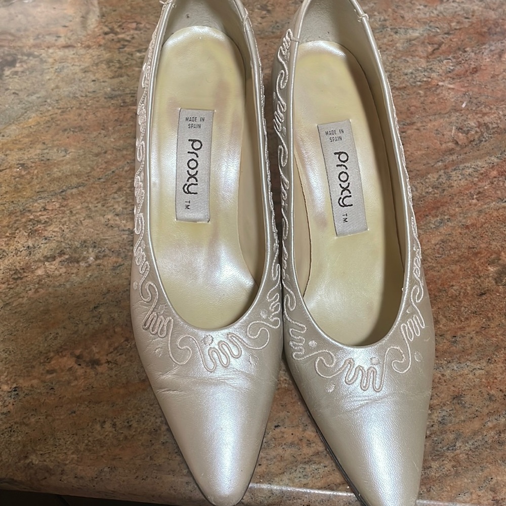 Pearl beige heels.